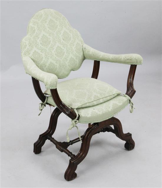 A 17th century style walnut X frame armchair, W.2ft 5in. H.3ft 2in.